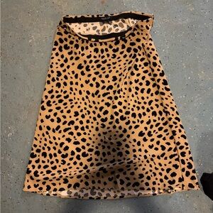 Rachel Tan and Black A-Line Skirt